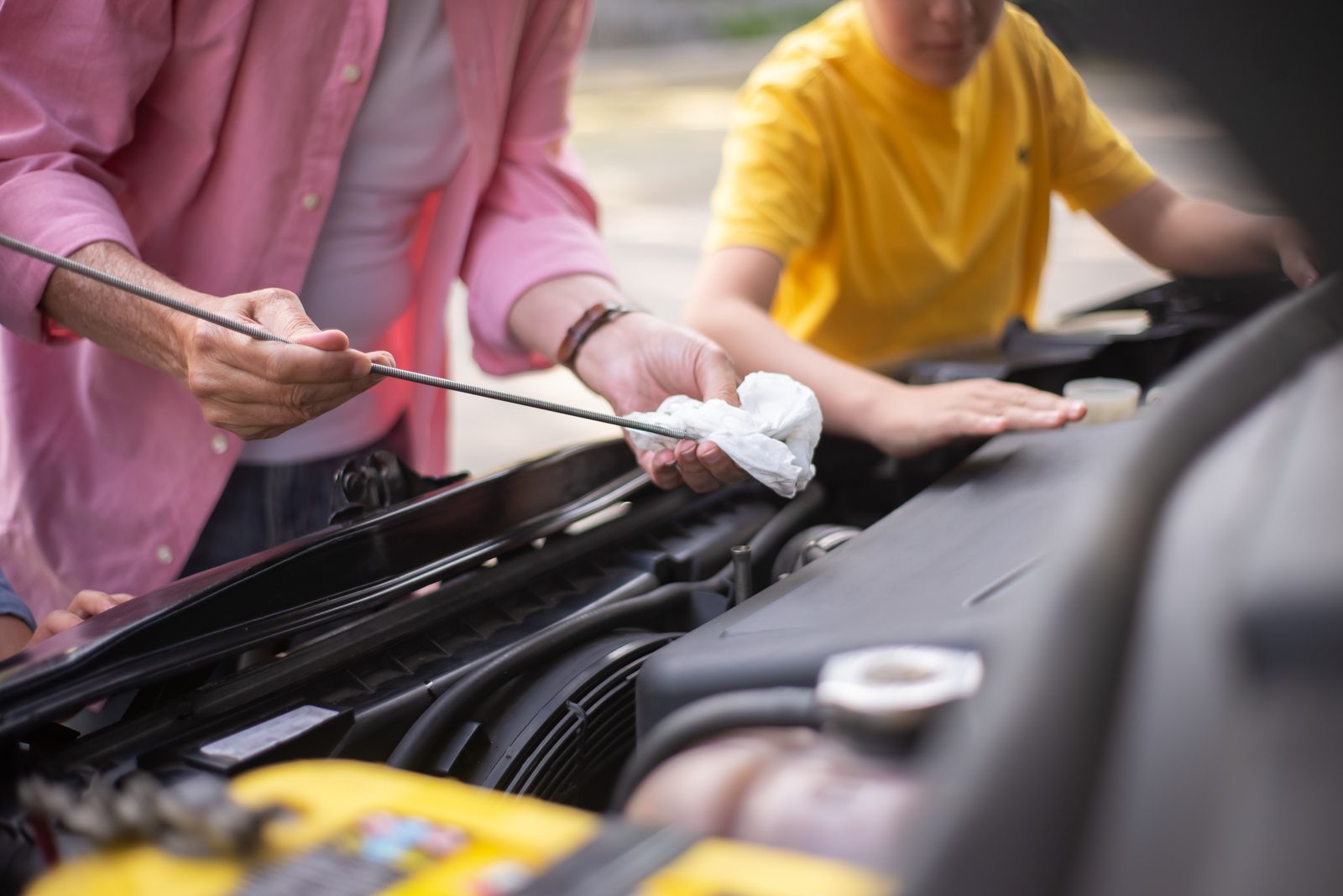 Close inspection under the hood during a full detail