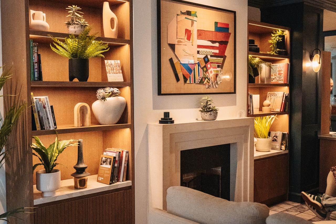 Modern cozy living room with a rebuilt fireplace surround