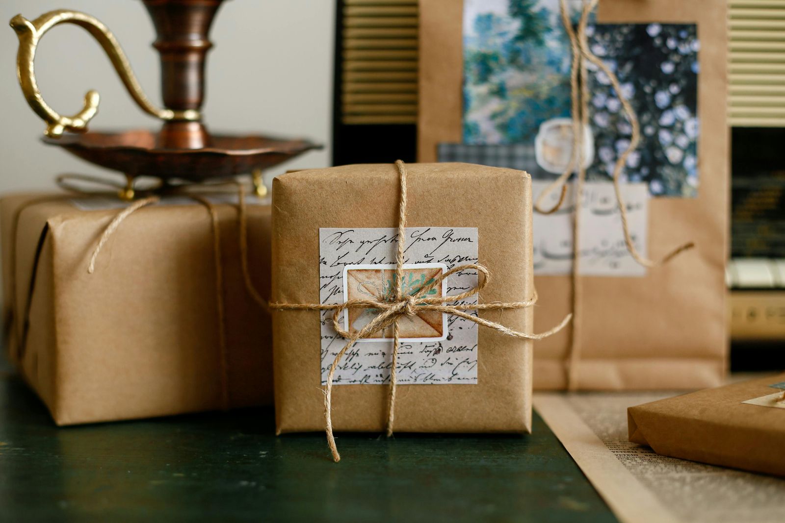 A bouquet wrapped in rustic brown kraft paper and tied with twine on the counter